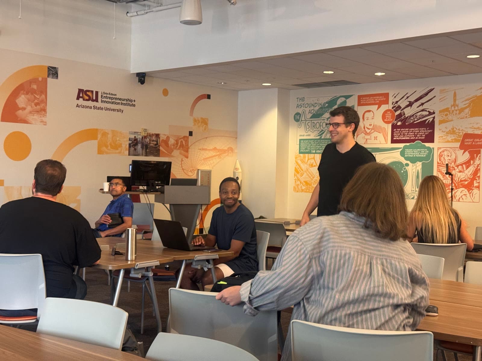 Kyle Chalmers talking through a problem with workshop attendees